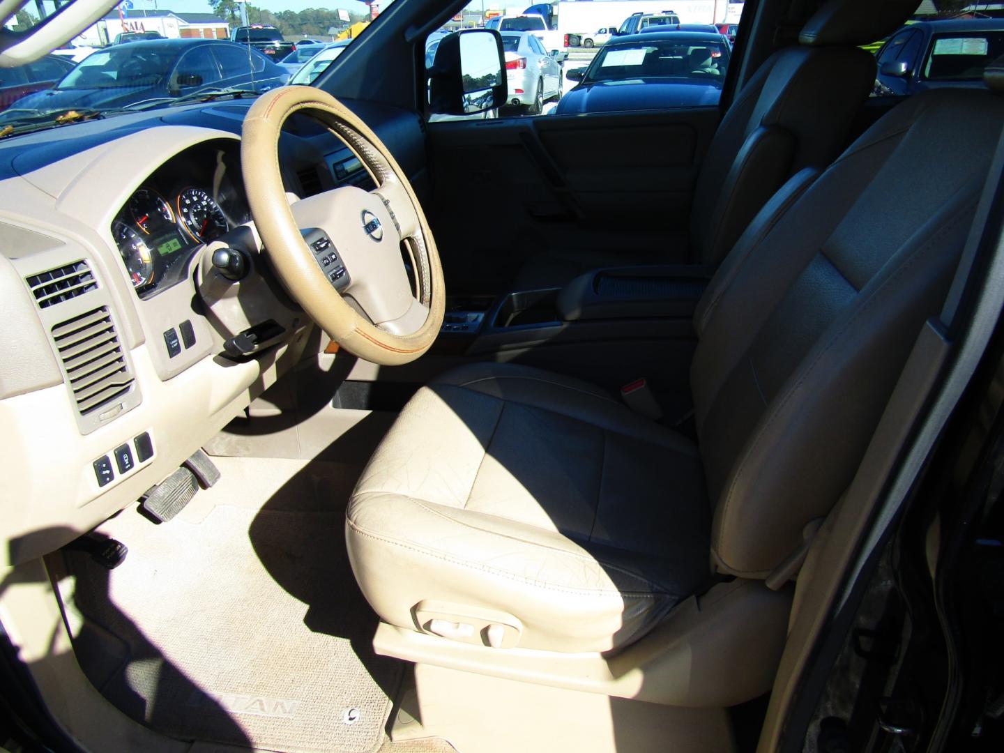 2011 Black /Tan Nissan Titan (1N6BA0ED1BN) , Automatic transmission, located at 15016 S Hwy 231, Midland City, AL, 36350, (334) 983-3001, 31.306210, -85.495277 - Photo#3